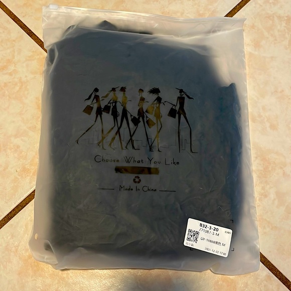 This is a black, pant leg, lacy onesie. Great for a dinner, formal event, etc. - Picture 1 of 4